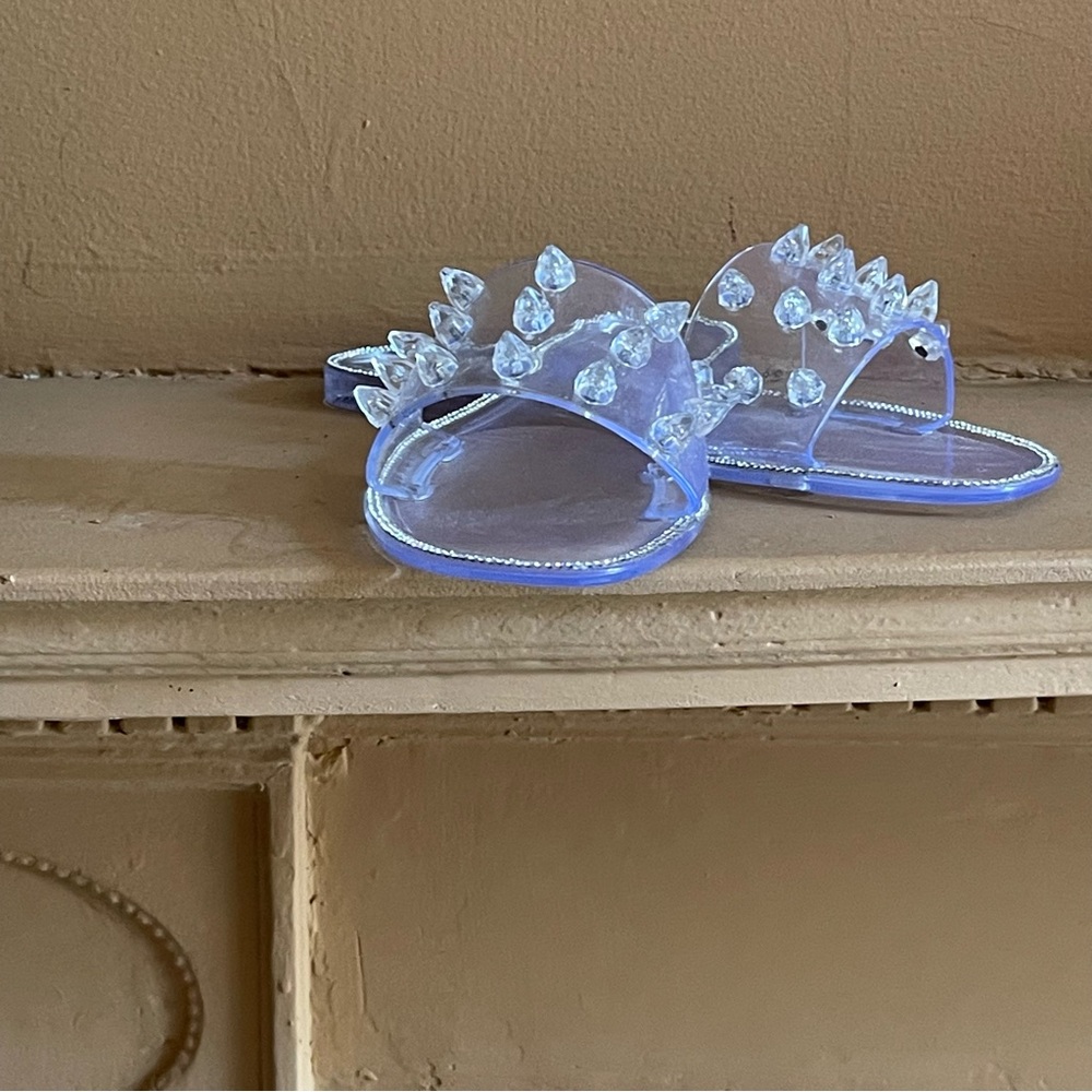 Designer, couture, jelly sandals.